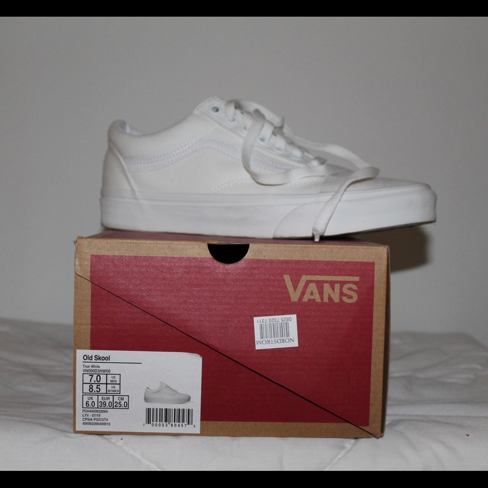 White women’s Vans
